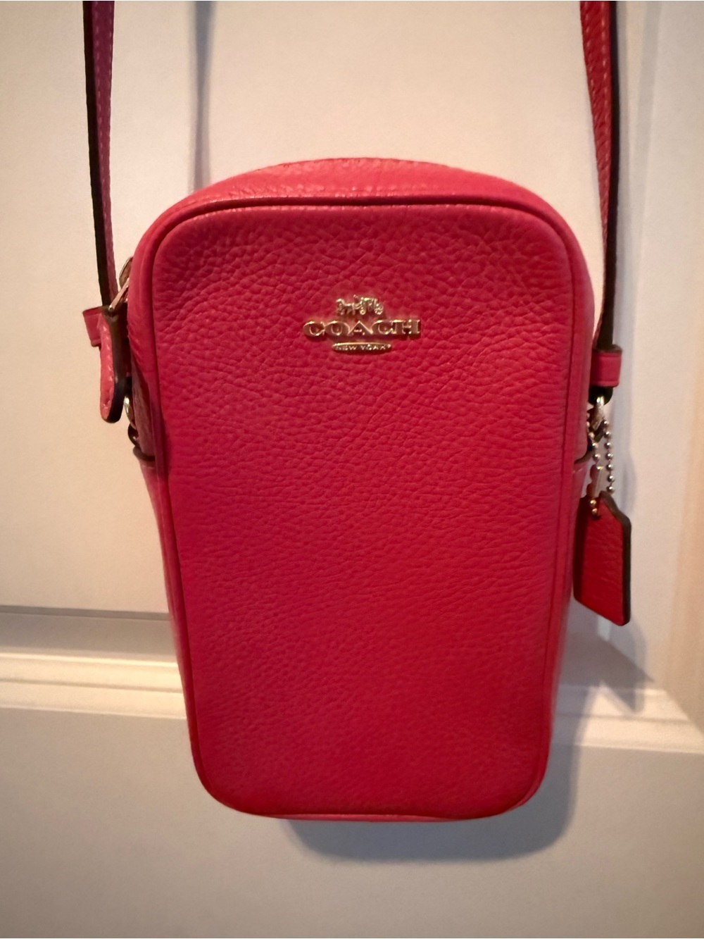 Coach Pebble Leather Crossbody Phone Bag in Fuchsia with Gold Hardware
